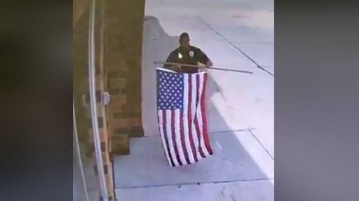 Police Officer Is Caught On Camera Fixing Fallen US Flag At Auto-Repair ...